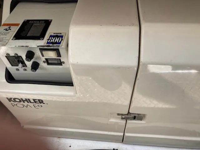 Slide: The Image of Kohler generator on a 1998 Formula 31 PC boat, featuring control panel and branding. - 17