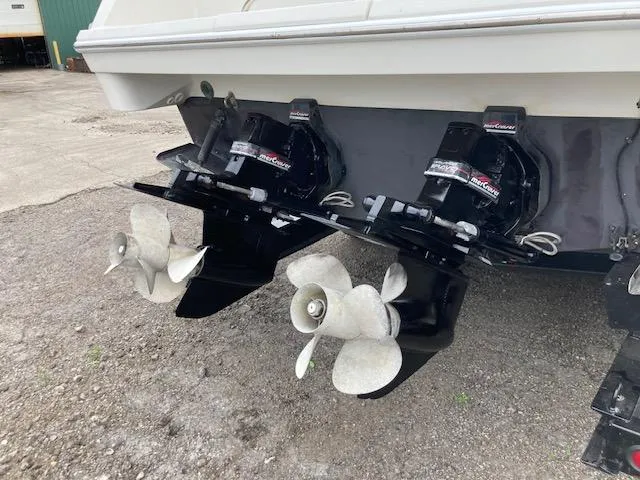 Slide: The Image of 1998 Formula 31 PC boat with dual propellers and outdrives, rear view. - 19