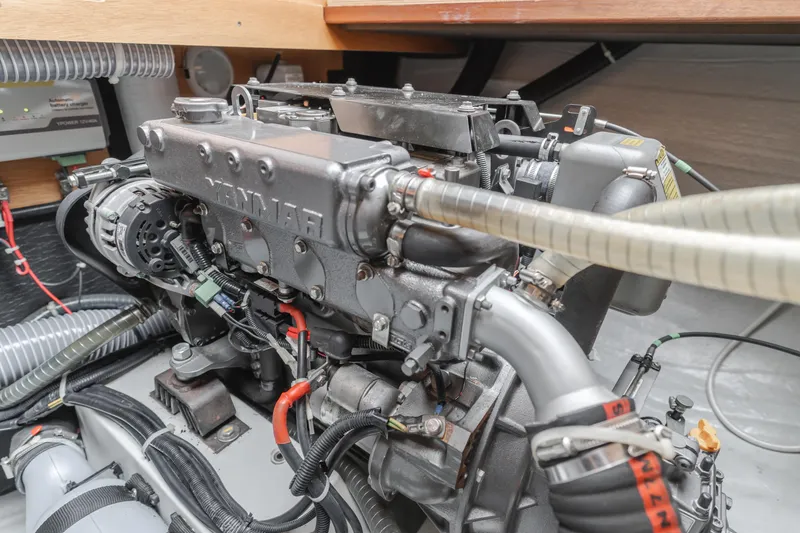 Slide: The Image of Engine compartment of a 2016 Lagoon 450F yacht, showcasing detailed mechanical components. - 20