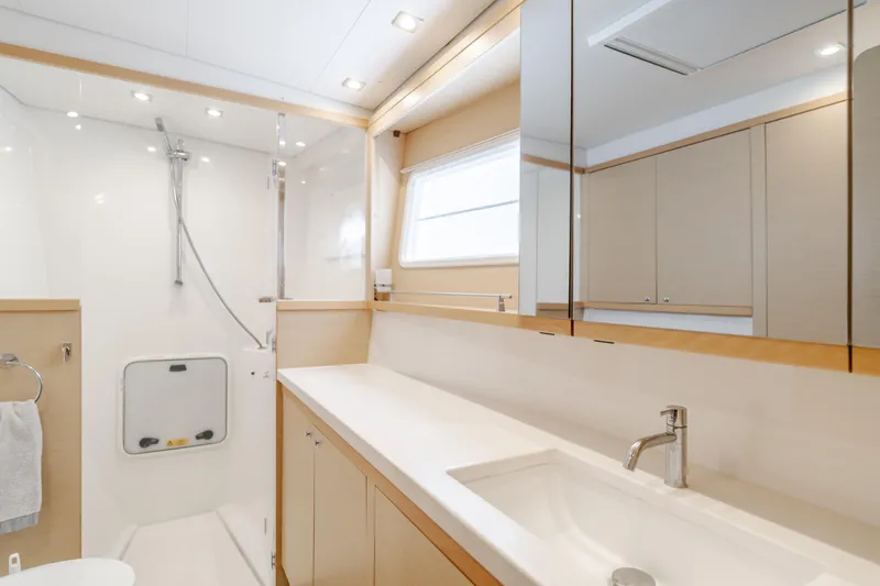 Slide: The Image of Luxurious bathroom in 2016 Lagoon 450F yacht with modern fixtures and spacious design. - 35
