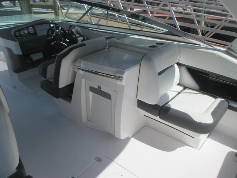 Slide: The Image of 2017 Regal 3200 Bowrider interior with sleek seating and modern dashboard. - 11