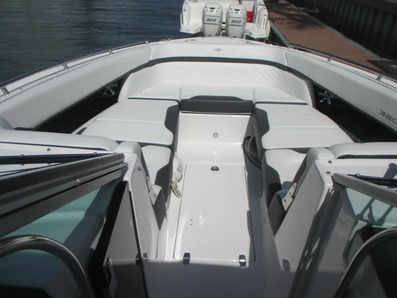 Slide: The Image of 2017 Regal 3200 Bowrider boat interior with spacious seating and sleek design. - 18