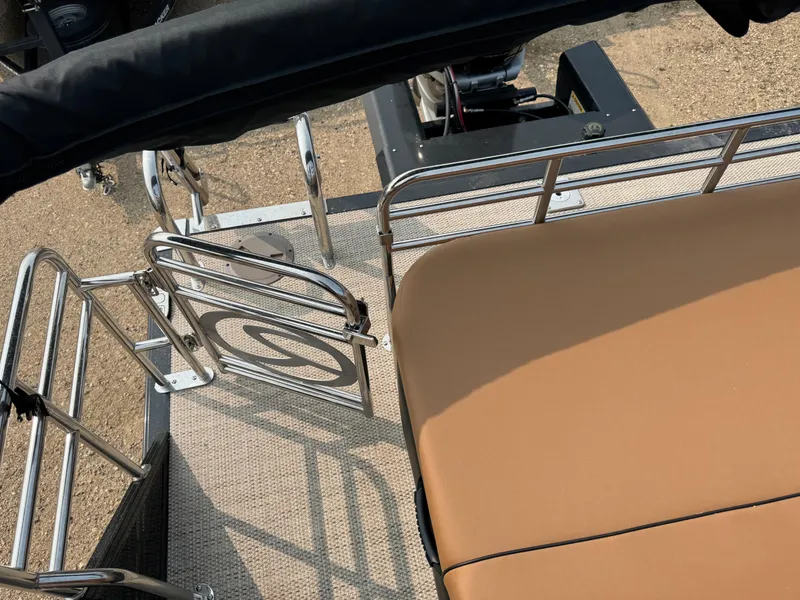 Slide: The Image of Luxurious seating with cup holders in 2025 Regency 230 LE3 Sport boat interior. - 16