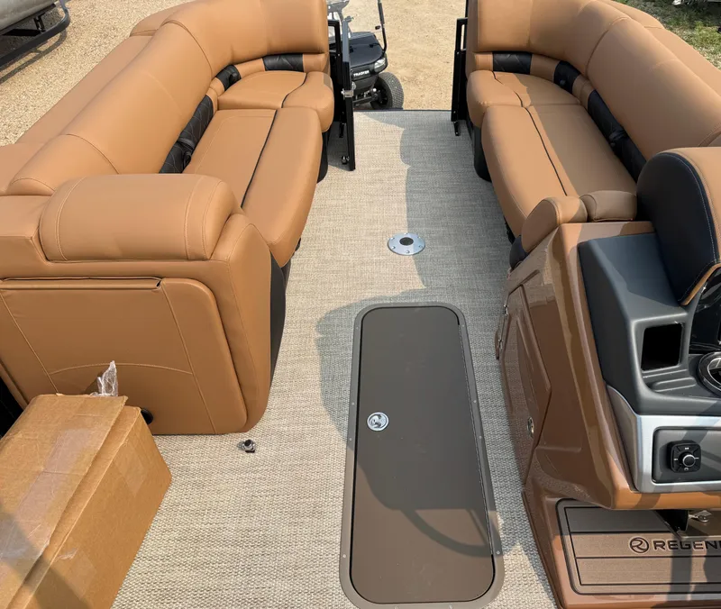 Slide: The Image of Luxurious tan leather seat in 2025 Regency 230 LE3 Sport boat interior. - 17