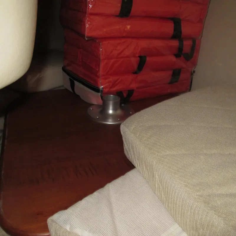 Slide: The Image of Cushions and life jackets on a 2007 Sea Ray 280 DA boat interior. - 32