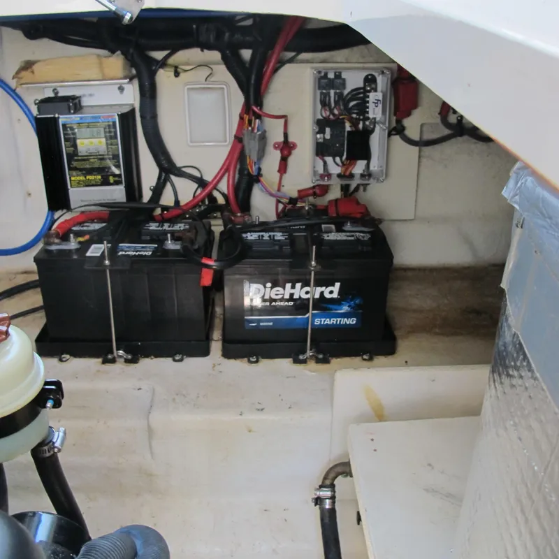 Slide: The Image of Battery compartment of a 2007 Sea Ray 280 DA boat with DieHard batteries. - 40