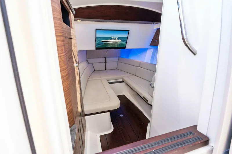 Slide: The Image of Luxurious interior of 2019 Boston Whaler 350 Realm with plush seating and modern amenities. - 6