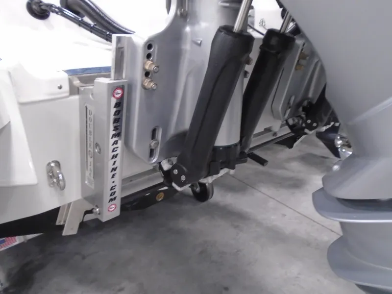 Slide: The Image of 2025 Caymas 281 HB boat engine mount and hydraulic system close-up. - 29