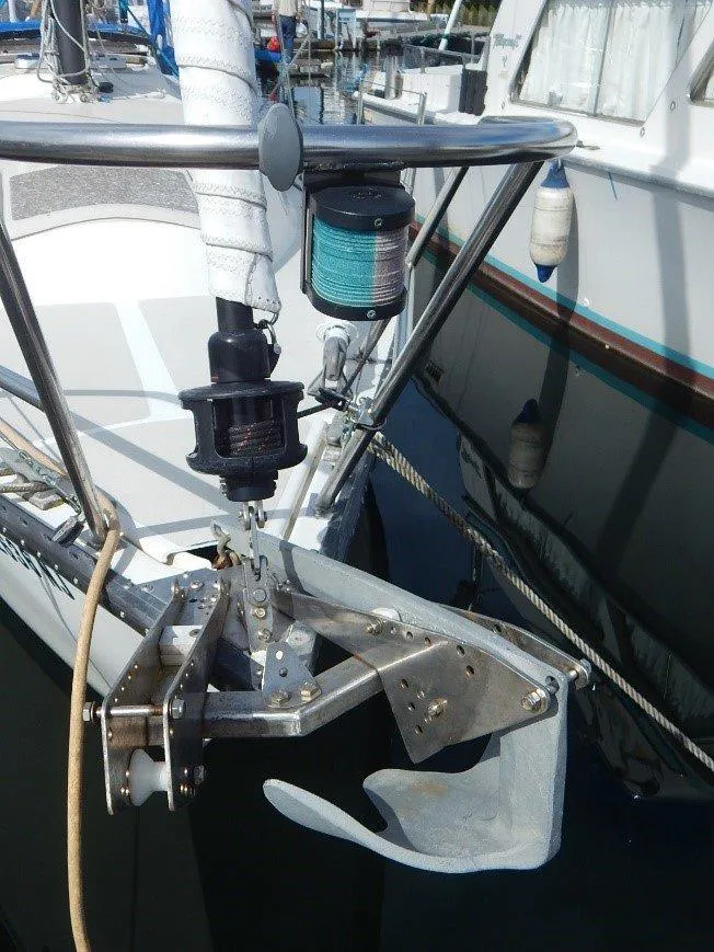 Slide: The Image of 1983 Newport 28 Sloop sailboat bow with anchor and rigging details. - 3