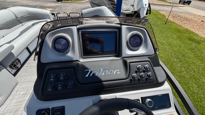 Slide: The Image of 2025 JC Neptoon 25TT Sport dashboard with steering wheel and control panel. - 20