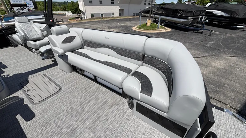 Slide: The Image of 2025 JC Neptoon 25TT Sport pontoon boat with luxurious gray seating. - 24