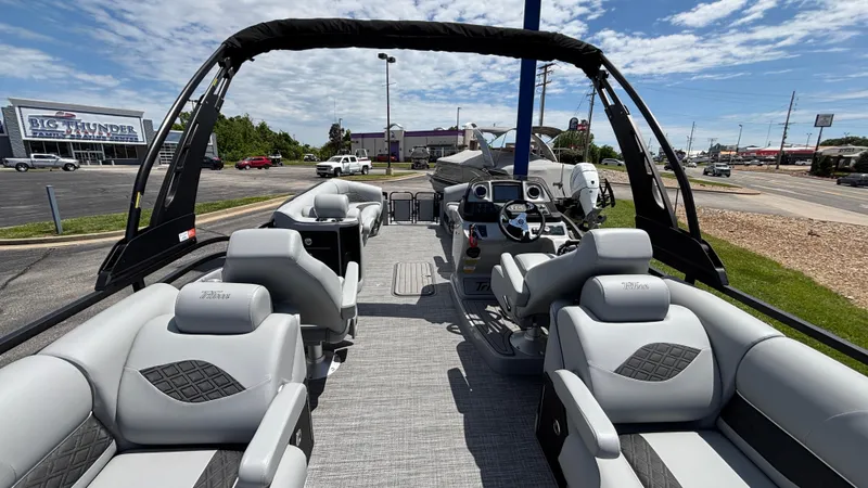 Slide: The Image of 2025 JC Neptoon 25TT Sport pontoon boat with luxurious seating and modern design. - 12