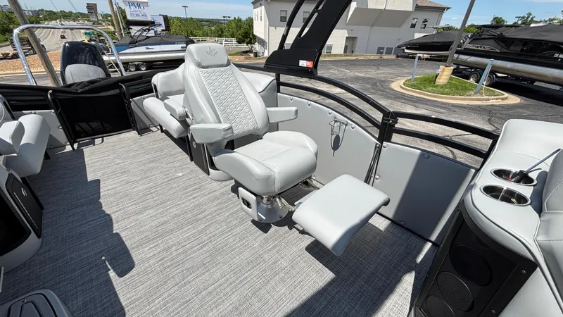 Slide: The Image of 2025 JC Neptoon 25TT Sport pontoon boat interior with luxurious seating and modern design. - 21