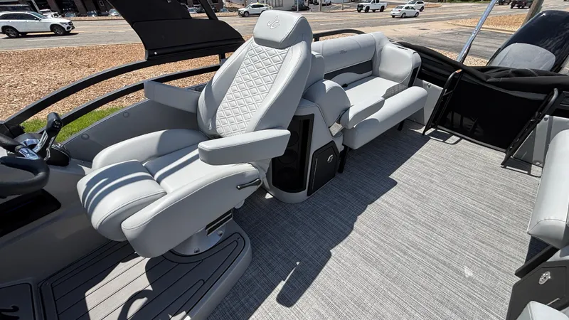 Slide: The Image of 2025 JC Neptoon 25TT Sport boat interior with luxurious seating and modern design. - 25
