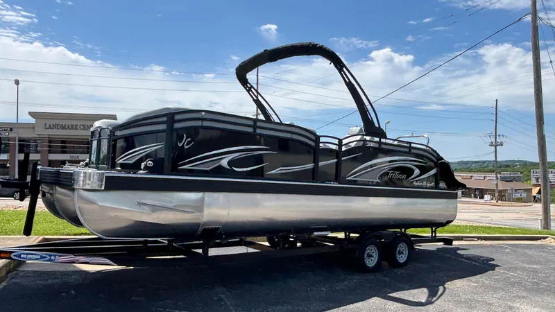 Slide: The Image of 2025 JC Neptoon 25TT Sport pontoon boat on trailer, parked outdoors. - 38