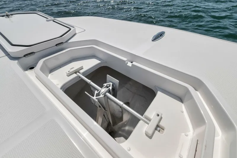 Slide: The Image of Anchor compartment of 2018 Invincible 40 Catamaran on open water. - 14