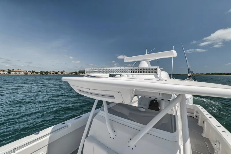 Slide: The Image of 2018 Invincible 40 Catamaran on water, showcasing sleek design and advanced features. - 21