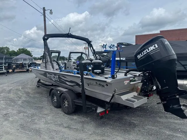 Slide: The Image of 2023 SeaArk Pro Cat 240 boat with Suzuki engine on a trailer. - 6