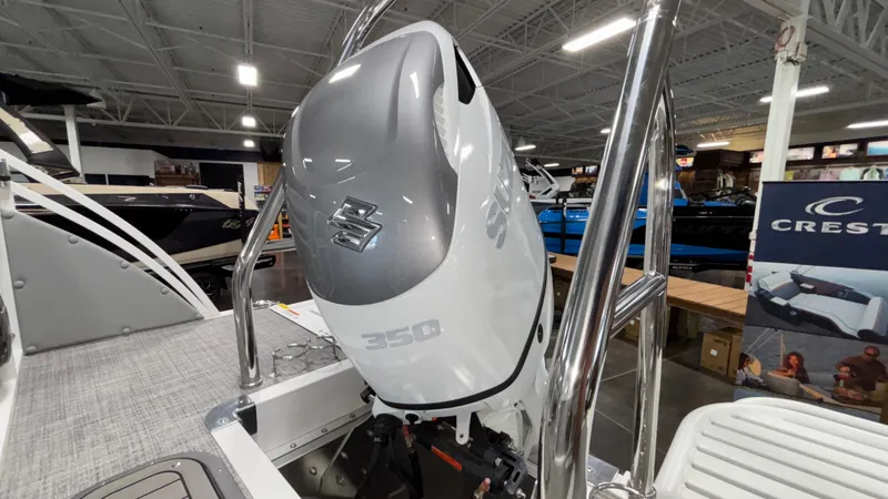 Slide: The Image of 2025 JC Neptoon 25TT Sport boat with Suzuki 350 outboard motor in showroom. - 17