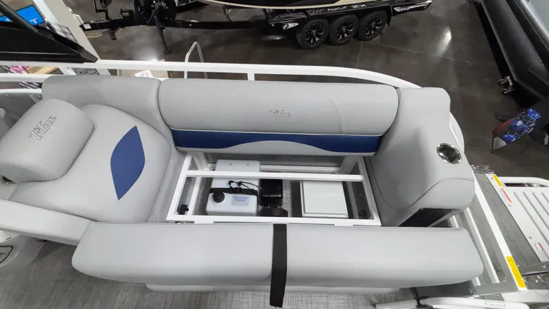 Slide: The Image of 2025 JC Neptoon 25TT Sport pontoon boat interior with gray seating and storage compartment. - 20