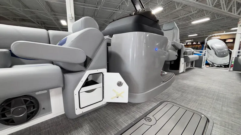 Slide: The Image of 2025 JC Neptoon 25TT Sport boat interior with modern seating and storage features. - 29