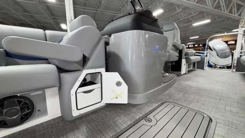Slide: The Image of 2025 JC Neptoon 25TT Sport boat interior with modern seating and storage compartments. - 30