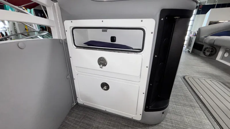 Slide: The Image of Interior storage compartment of 2025 JC Neptoon 25TT Sport pontoon boat. - 33