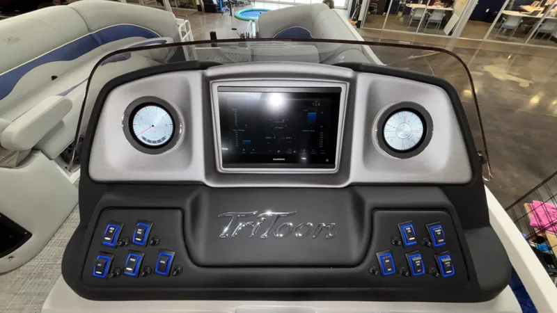 Slide: The Image of Control panel of 2025 JC Neptoon 25TT Sport boat with modern gauges and touchscreen. - 40