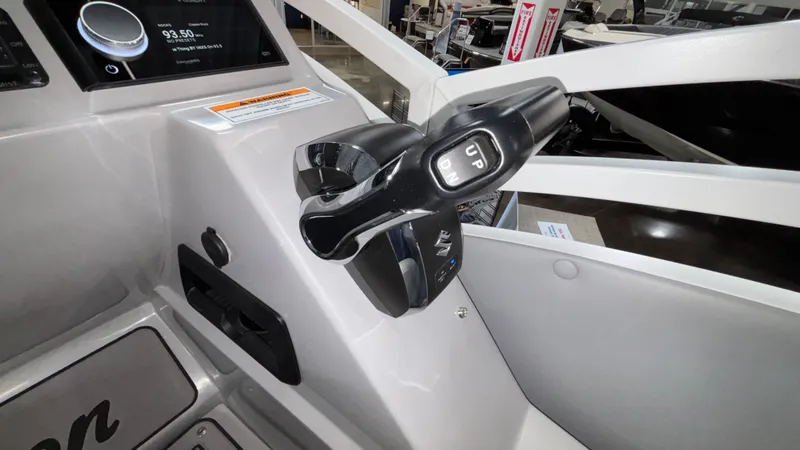 Slide: The Image of 2025 JC Neptoon 25TT Sport boat control panel with throttle lever. - 41