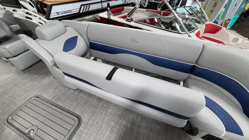 Slide: The Image of 2025 JC Neptoon 25TT Sport pontoon boat interior with gray and blue seating. - 42