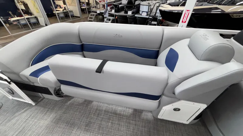 Slide: The Image of 2025 JC Neptoon 25TT Sport boat interior with gray and blue seating. - 44