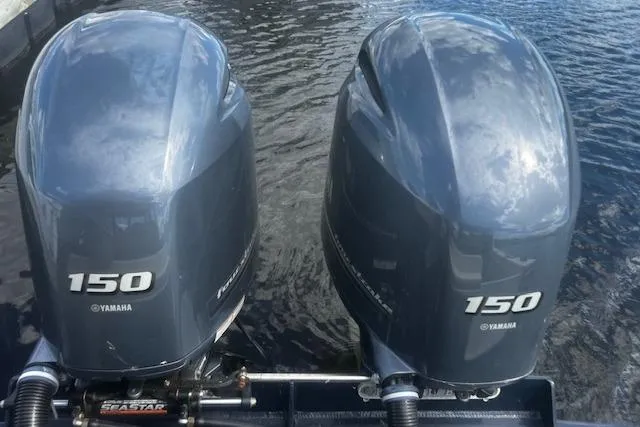 Slide: The Image of Twin Yamaha 150 outboard motors on a 2016 Eastern 27 Islander boat. - 10