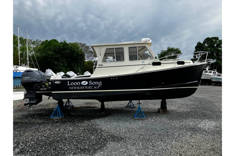 Slide: The Image of 2016 Eastern 27 Islander boat on stands, Newburyport, MA, overcast sky. - 30