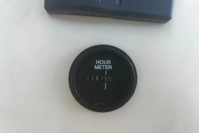 Slide: The Image of Hour meter reading on 2016 Eastern 27 Islander boat dashboard. - 40
