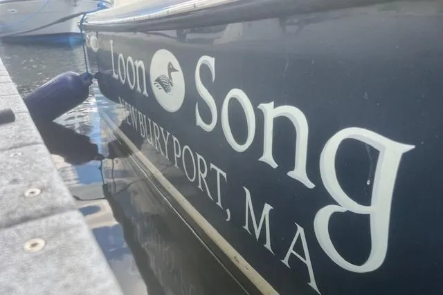 Slide: The Image of Eastern 27 Islander boat named "Loon Song" docked in Newburyport, MA, 2016 model. - 37