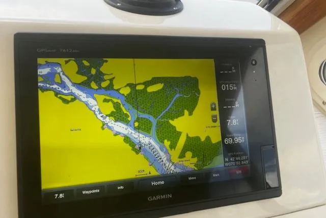 Slide: The Image of Garmin GPS display on 2016 Eastern 27 Islander boat, showing navigational map. - 20