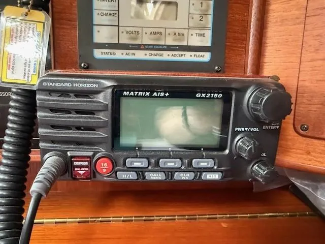 Slide: The Image of Standard Horizon Matrix AIS+ GX2150 radio on Tartan 40CB, 1987 model, mounted on wooden panel. - 44