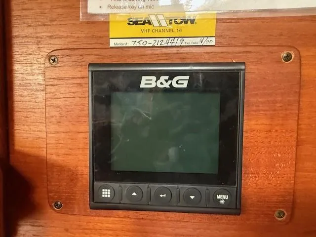 Slide: The Image of B&G marine display on 1987 Tartan 40CB sailboat, wooden panel background. - 46