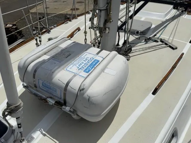 Slide: The Image of 1987 Tartan 40CB sailboat deck with secured life raft. - 48