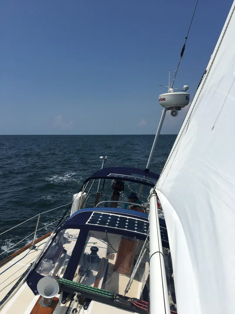 Slide: The Image of Sailing on a 1987 Tartan 40CB yacht with clear skies and open sea. - 7