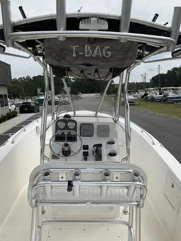 Slide: The Image of 2006 Sea Hunt Triton boat interior with steering console and seating. - 4