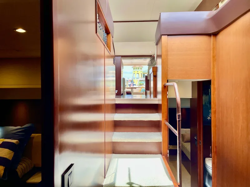 Slide: The Image of Interior of 2015 Princess f56 yacht with wooden stairs and modern design. - 24