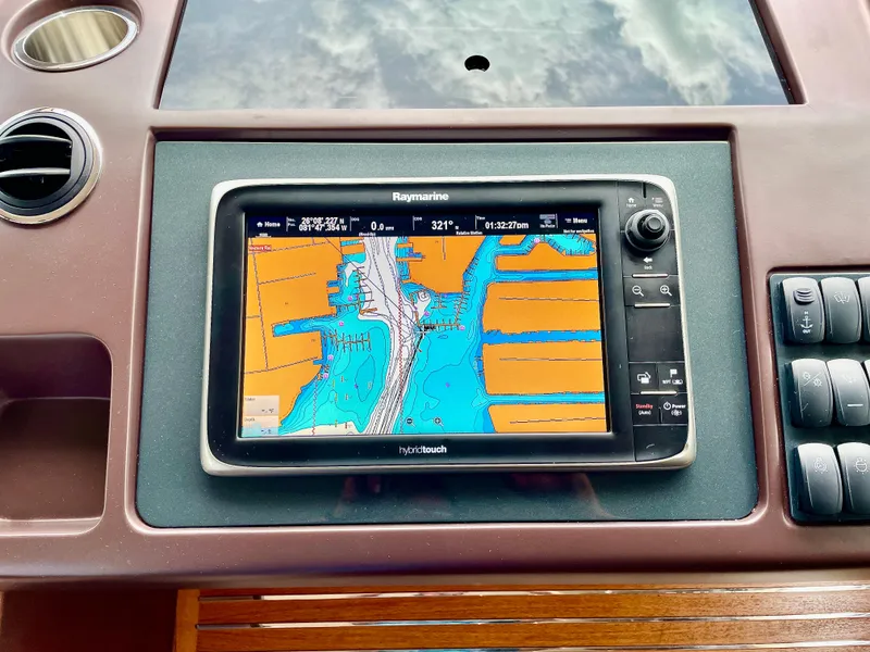 Slide: The Image of Boat navigation system on Princess f56, 2015 model, displaying nautical chart. - 31