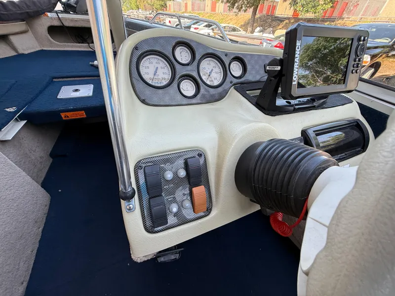 Slide: The Image of Lowrance Eagle 7 fish finder on 2002 Lowe Sea Nymph V Series FM 180 boat. - 27