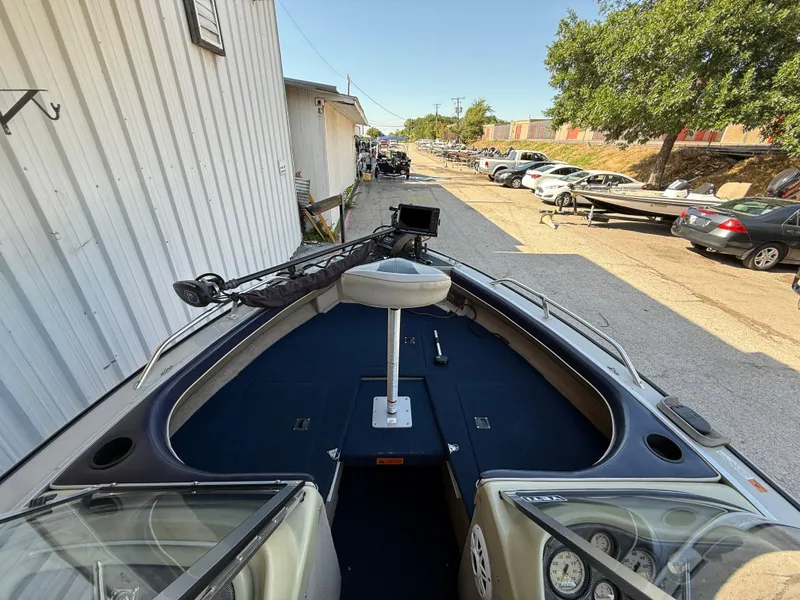 Slide: The Image of 2002 Lowe Sea Nymph V Series FM 180 boat dashboard with gauges and navigation equipment. - 28
