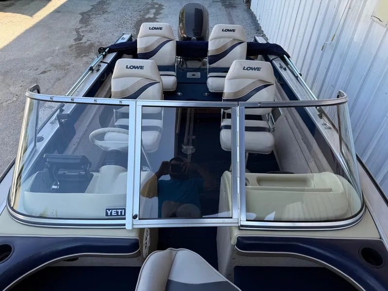 Slide: The Image of MotorGuide X3 trolling motor on 2002 Lowe Sea Nymph V Series FM 180 boat. - 34