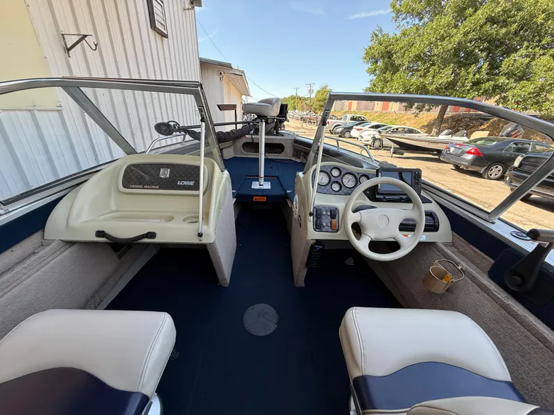 Slide: The Image of Open storage compartment on 2002 Lowe Sea Nymph V Series FM 180 boat. - 39