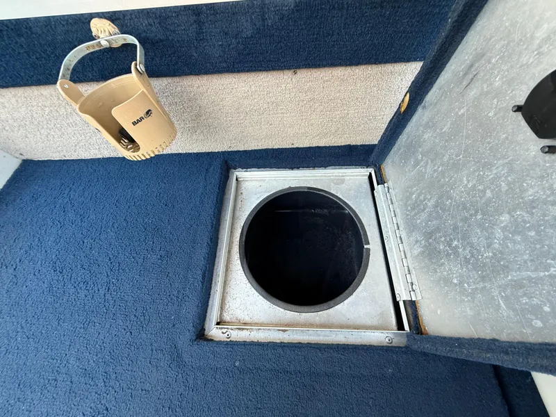 Slide: The Image of 2002 Lowe Sea Nymph V Series FM 180 boat interior with "Hardly Able" text. - 42