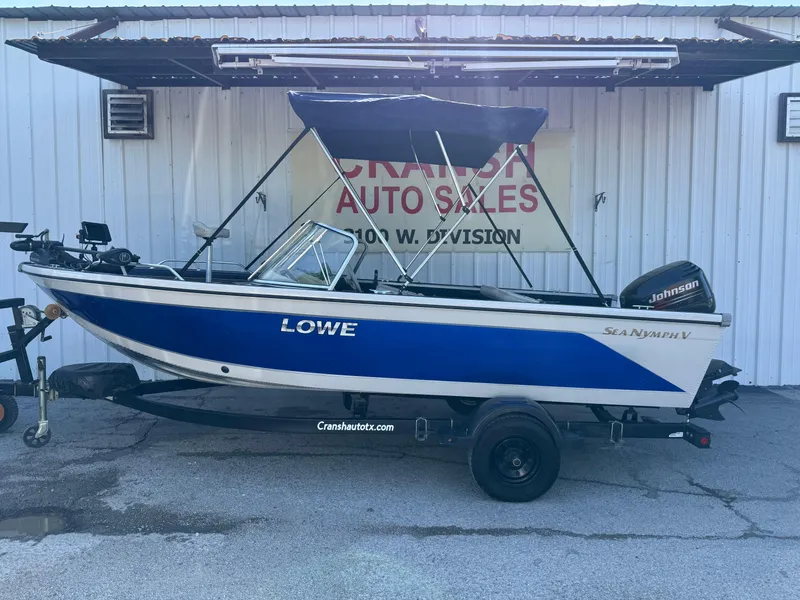 Slide: The Image of 2002 Lowe Sea Nymph V Series FM 180 boat with Johnson motor at Cransh Auto Sales. - 51
