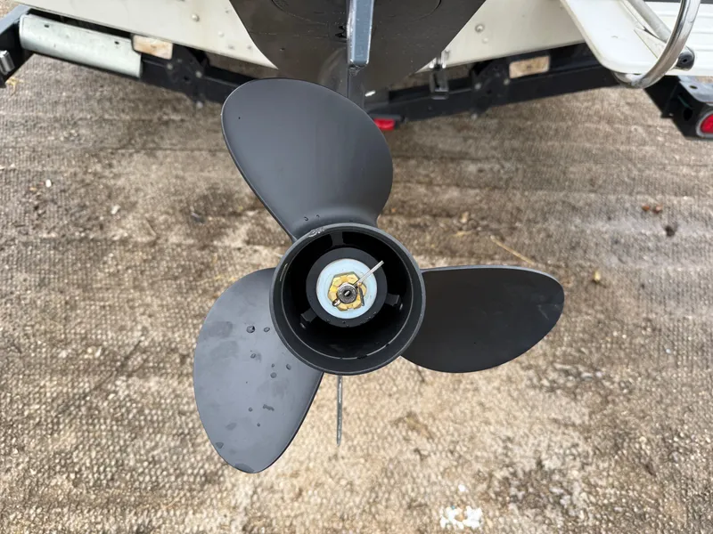 Slide: The Image of 2002 Lowe Sea Nymph V Series FM 180 boat with Johnson outboard motor on trailer. - 6